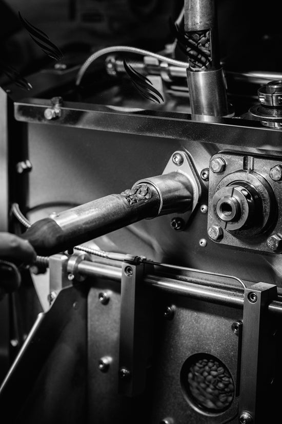 image of coffee roaster with trier full of roasting coffee beans
