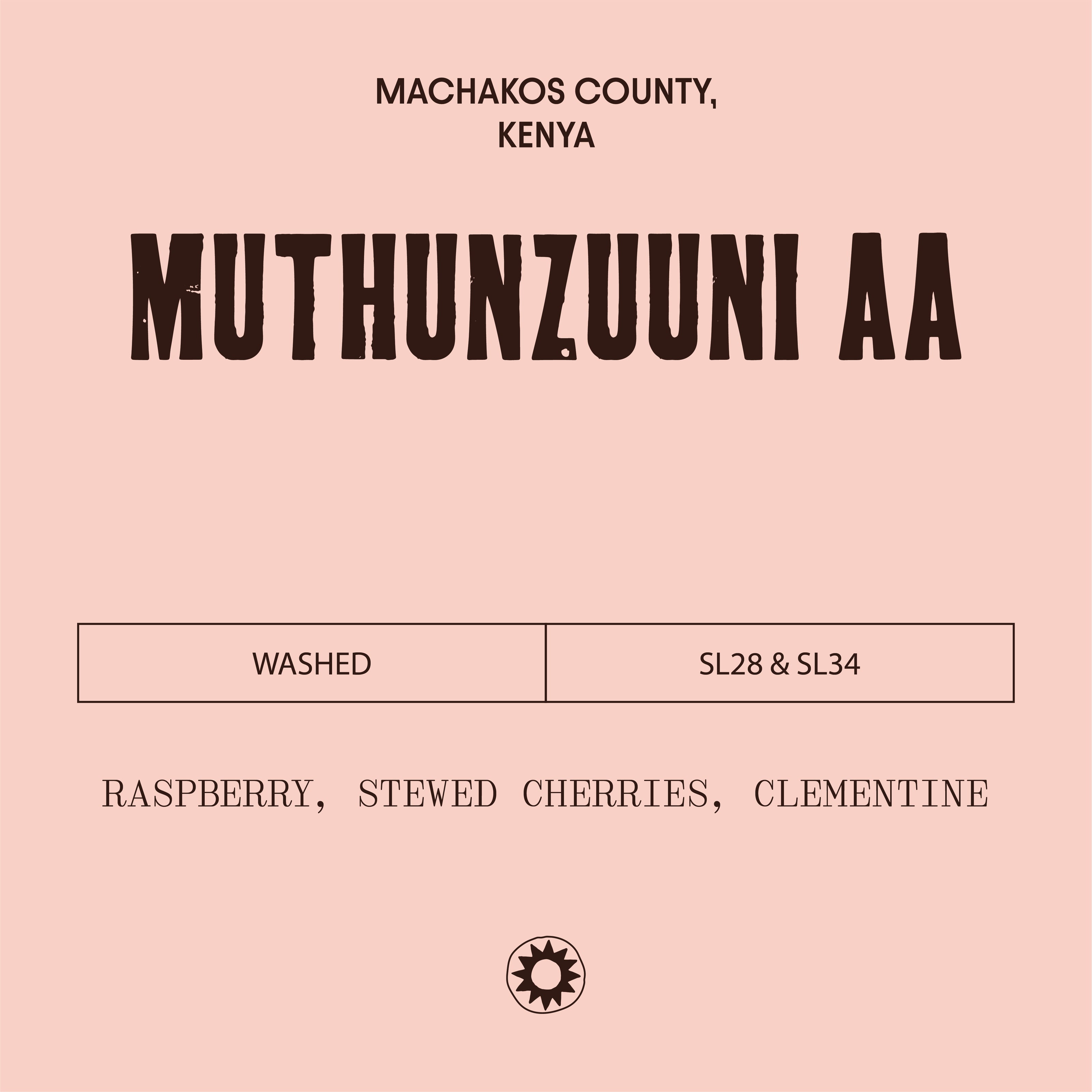 Pink label with black text and branding logo, featuring 'Muthunzuuni AA' and coffee description.