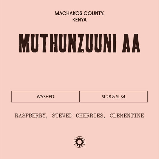 Pink label with black text and branding logo, featuring 'Muthunzuuni AA' and coffee description.