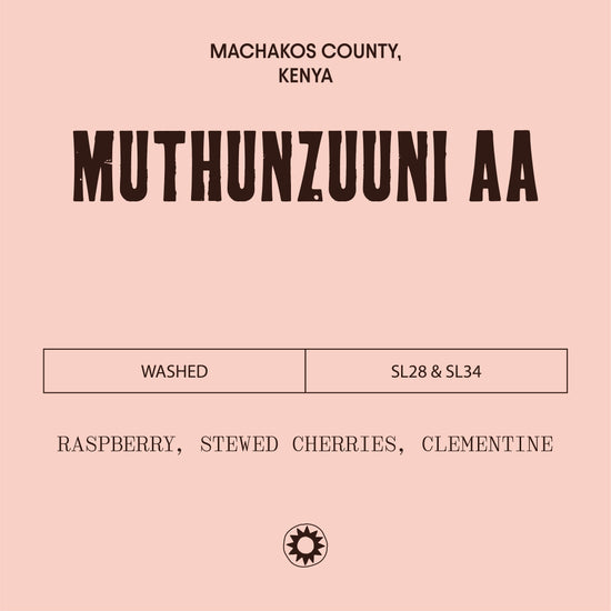 Pink label with black text and branding logo, featuring 'Muthunzuuni AA' and coffee description.