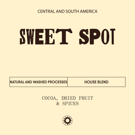 This light cream label describes the specific of the Sweet spot coffee include its natural and washed process with notes of cocoa, dried fruit and spices. 