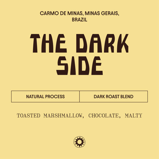 The yellow  label describes this coffee as a natural processed dark roast. It has notes of Toasted Marshmallow, chocolate and is malty. 